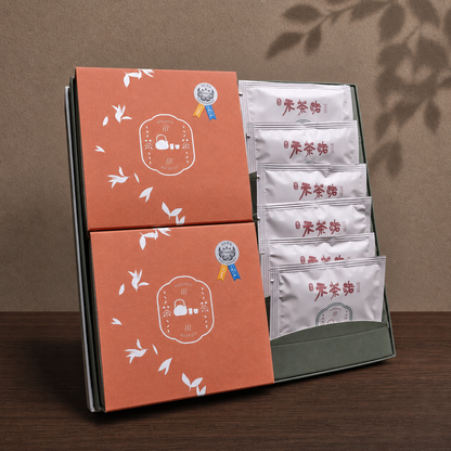 禾茶路茶包禮盒大開盒展示，橘色內盒與獨立包裝茶包